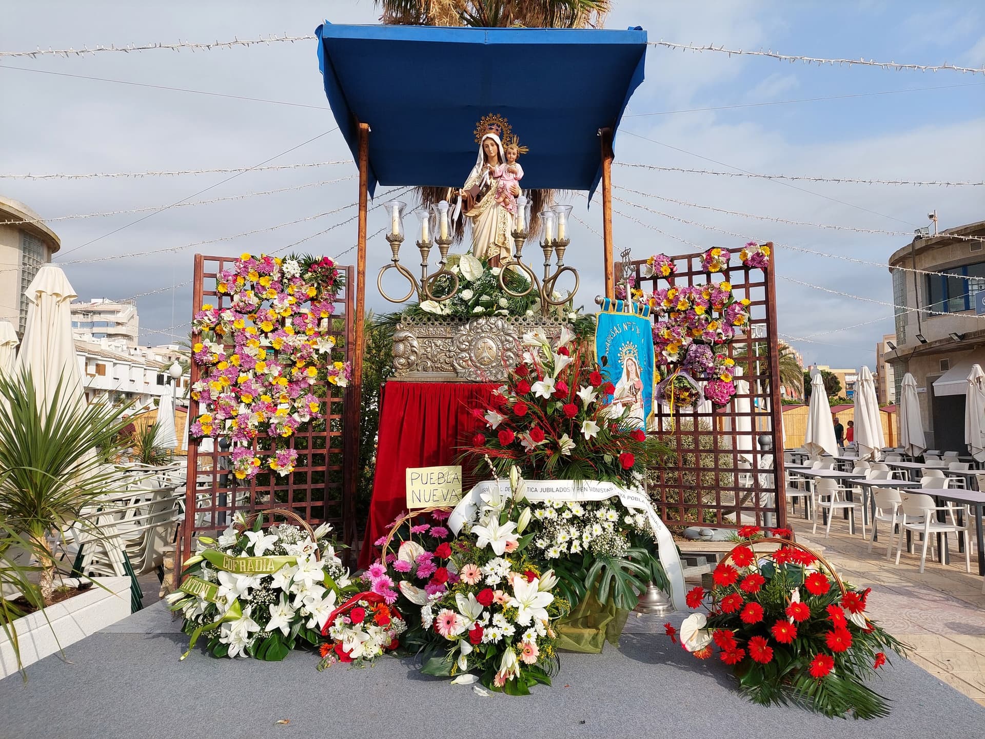 Cartel de La Pobla de Farnals se prepara para las Fiestas del Carmen con fervor y tradición